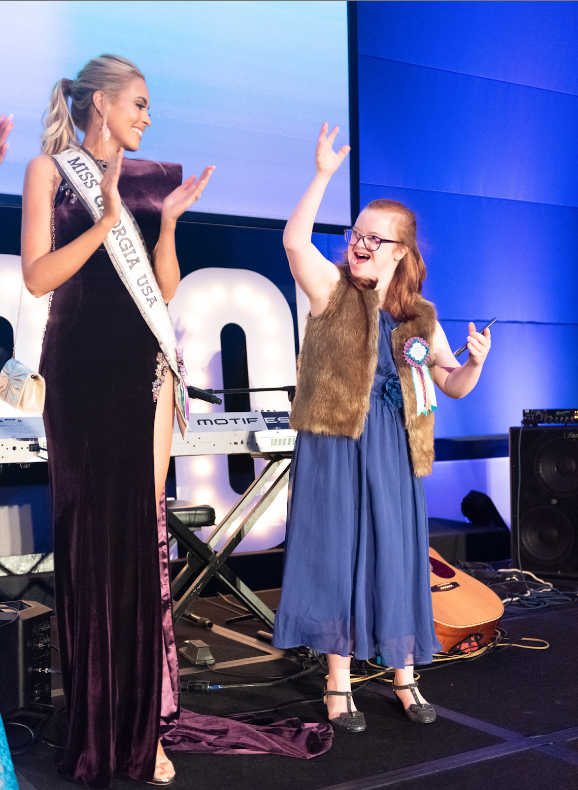 Darden on stage with Miss Georgia USA